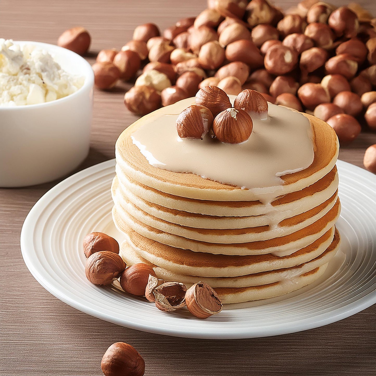 Pancakes con crema spalmabile proteica alla nocciola bianca